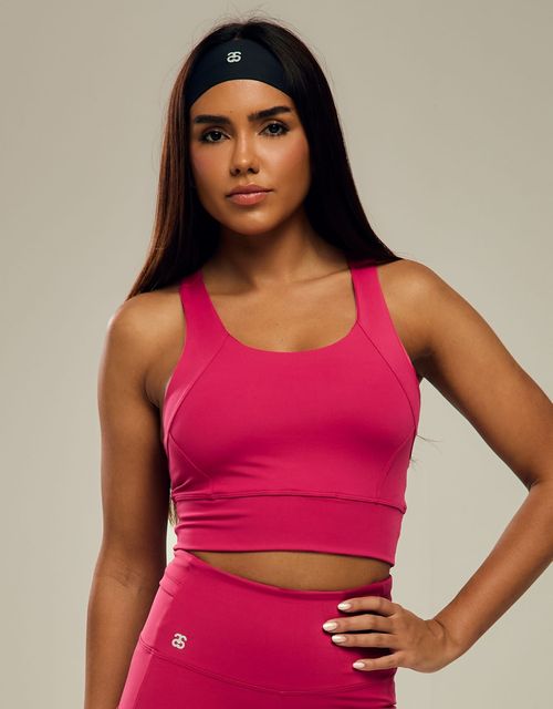 F546 - Top reforçado para corrida com bolso interno.
