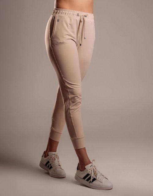 F445T-Calça sem recortes jogger com cordão e bolsos.