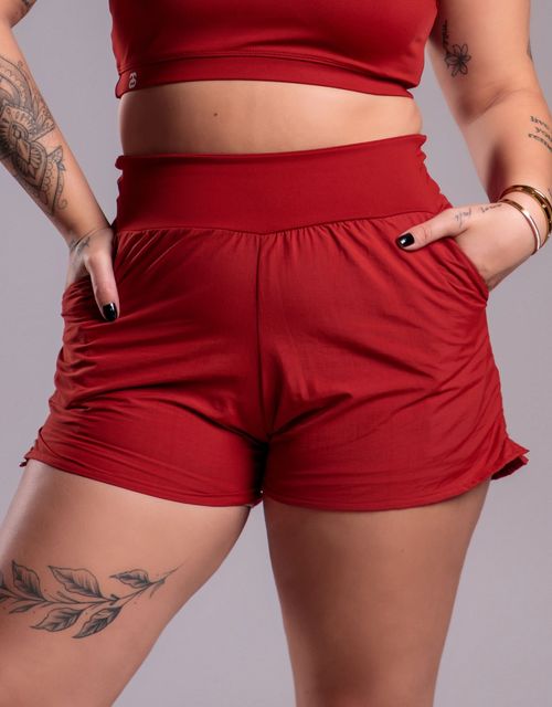 F486 - Short sobreposto em tactel com bolsos.