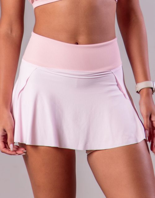 F436 -Short saia com bolso no cós.